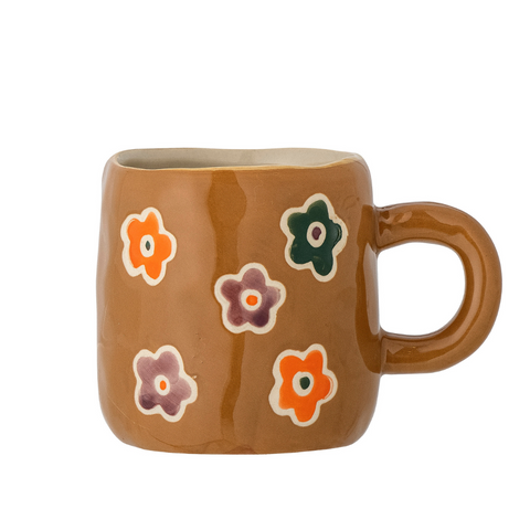 Tasse à expresso marron avec des fleurs inside déco
